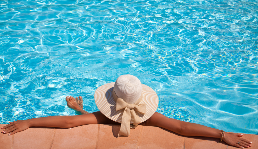 Woman relaxing and enjoying her propane pool heater.